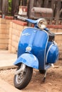 Blue retro Vespa moped Royalty Free Stock Photo